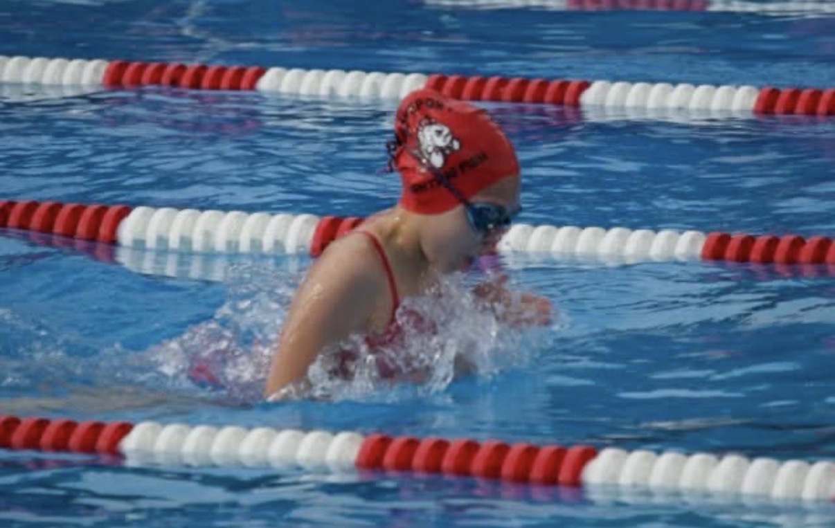 Aspyn swimming breaststroke