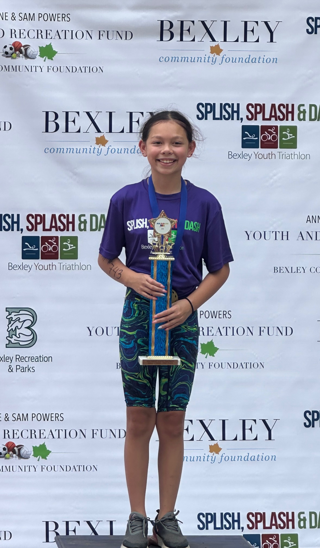 Aspyn with trophy at Bexley Youth Triathlon