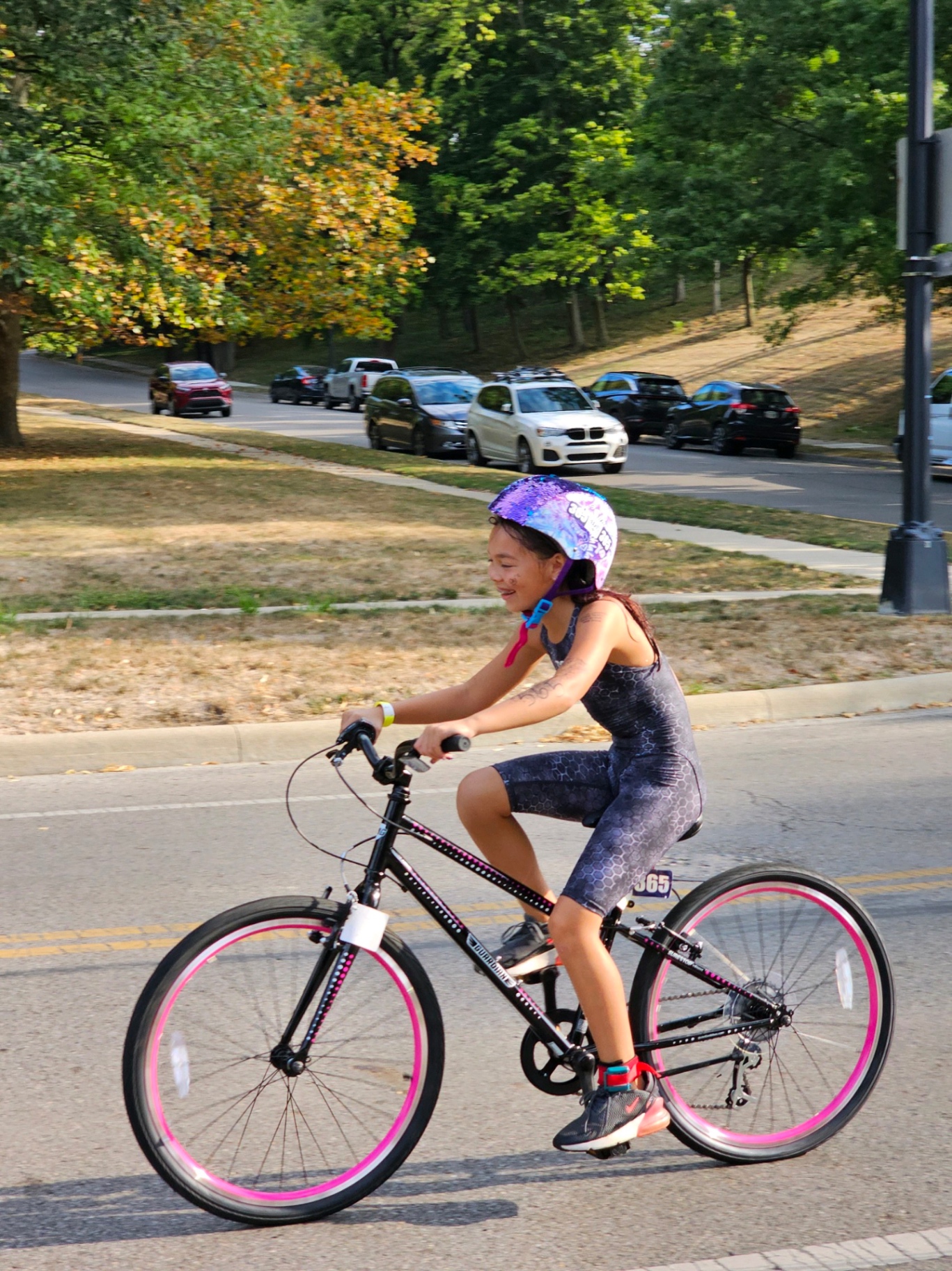 Aspyn on the bike leg of the triathlon